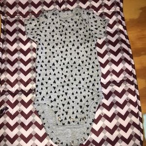 New born gray onesie with black hearts